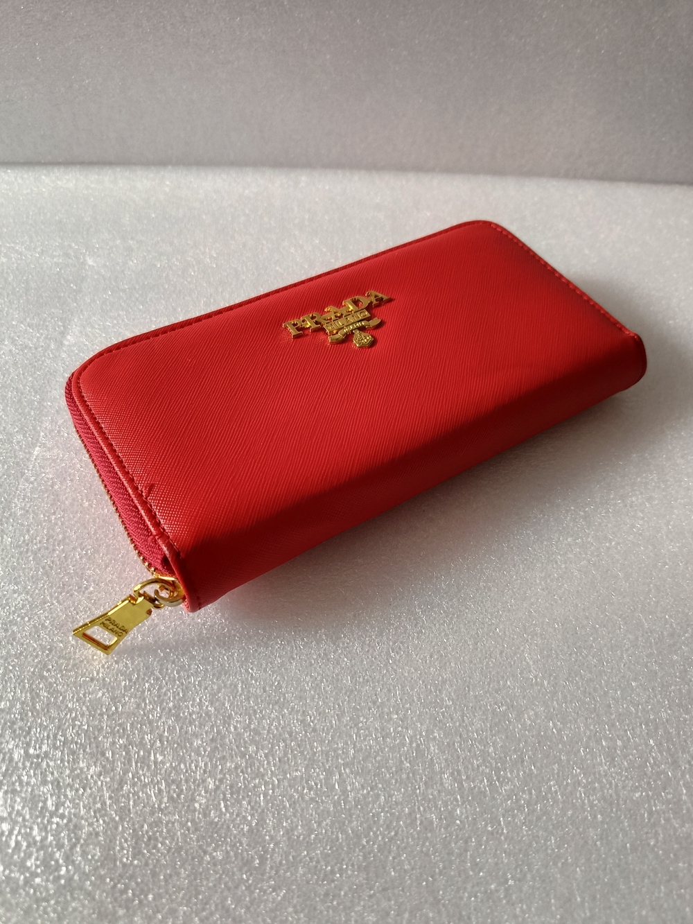 Prada Red Saffiano Zip-Around Wallet with Gold Logo